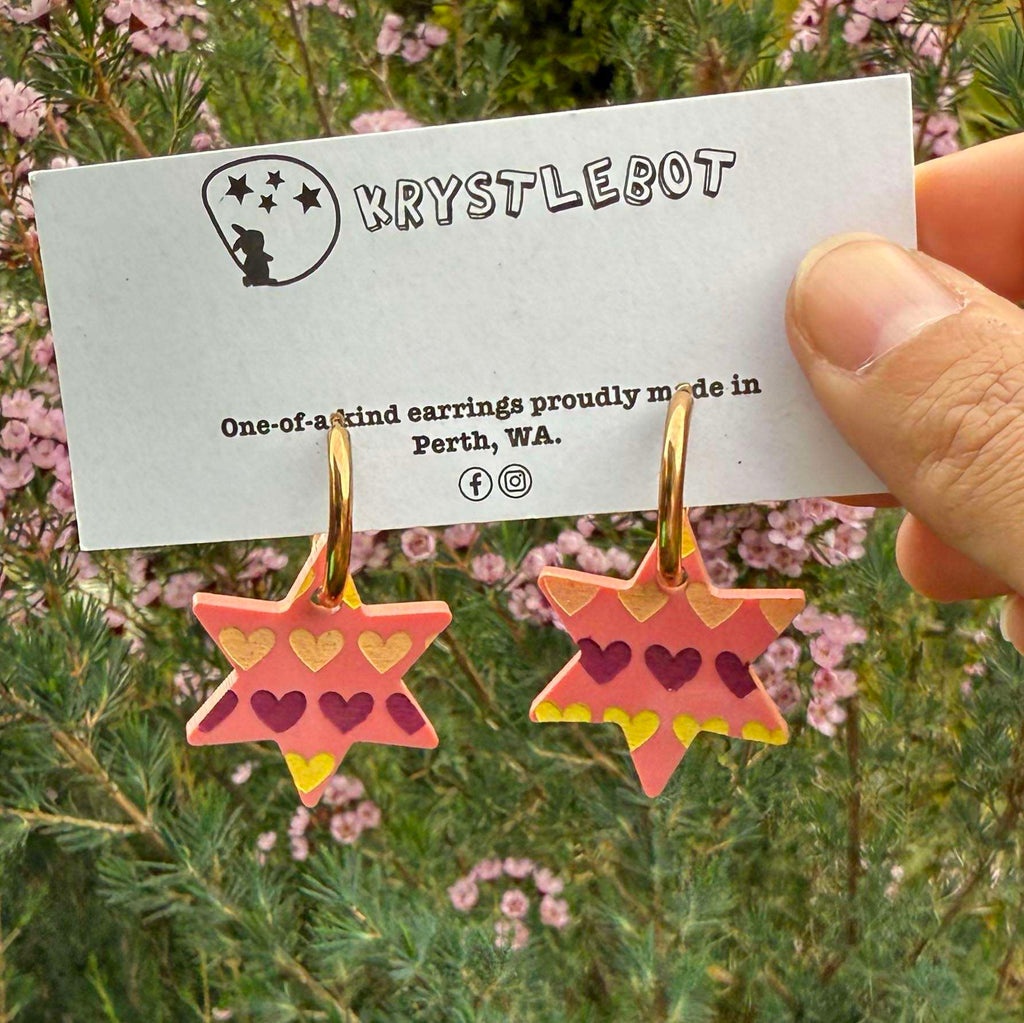 Raspberry star dangles hand painted with pink, yellow and peach hearts, Huggie Hoop Square Earrings, Lightweight Acrylic Dangles, One-Off