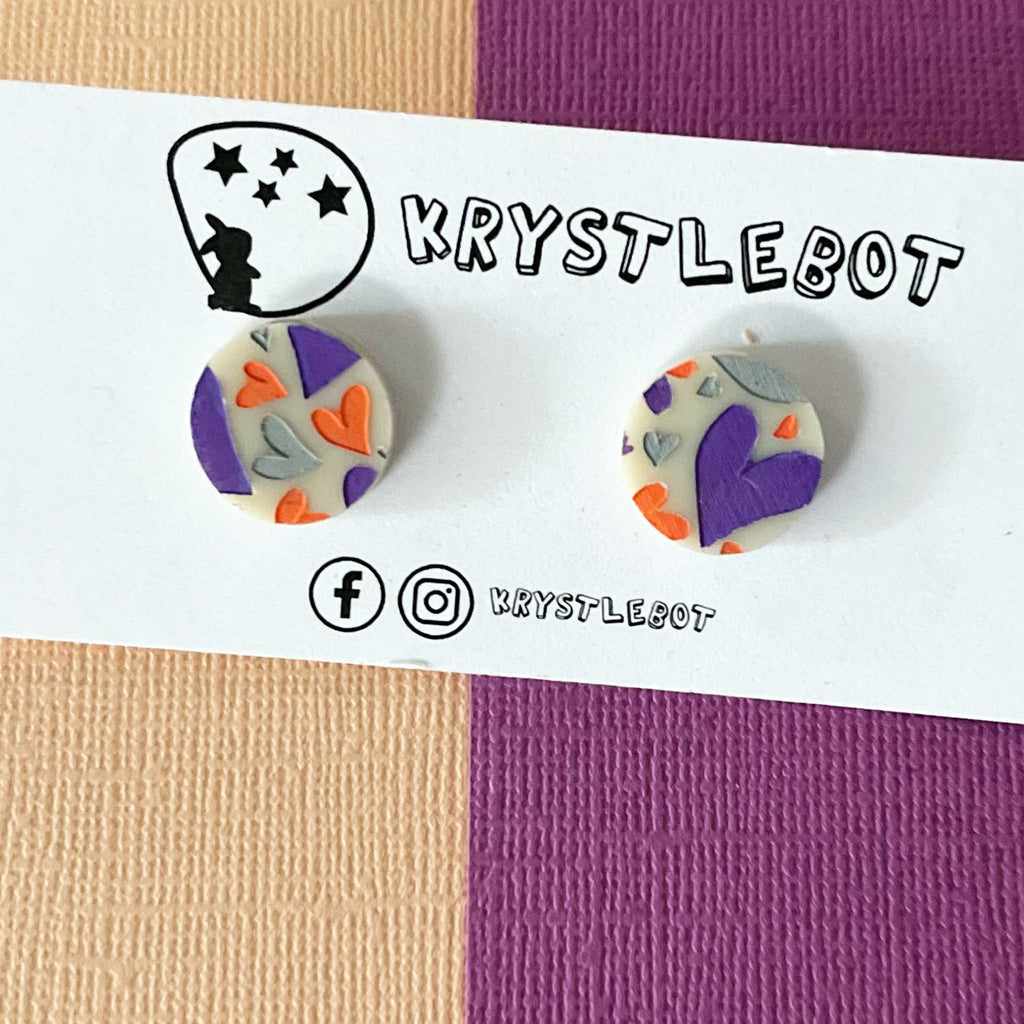 Heart pattern circle acrylic cream studs, hand painted in purple, orange and light grey. One-of-a-kind