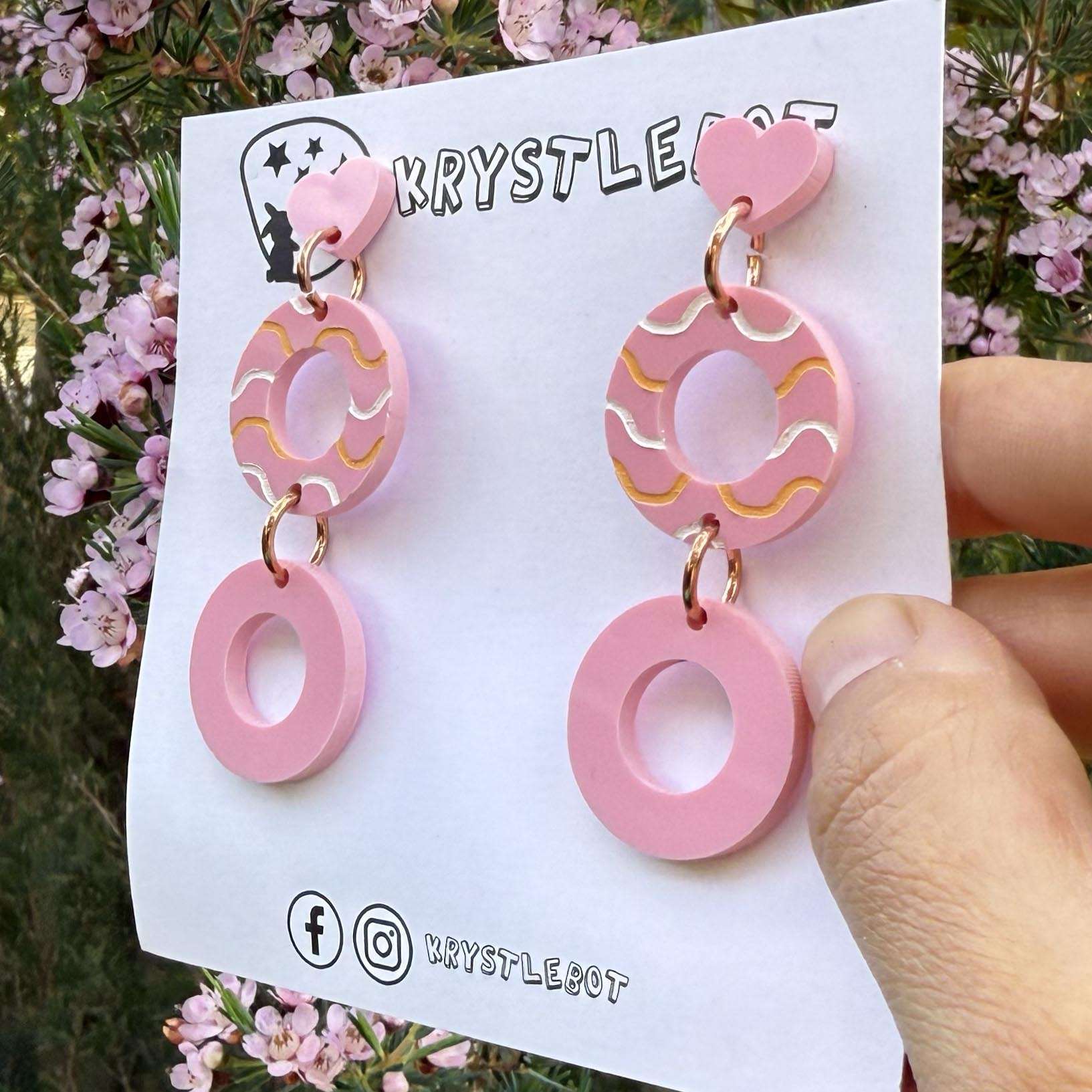 Pink Circle Statement One-of-a-kind Dangle Earrings with a light pink centre hand painted with a white and orange wave pattern.