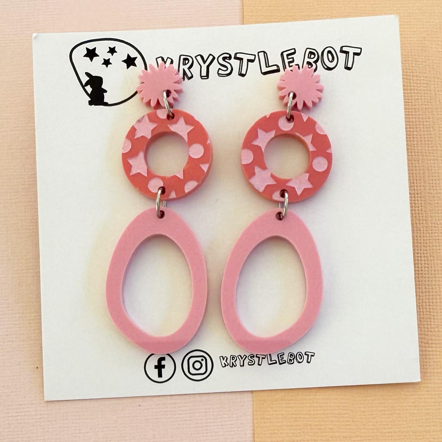 Two pink starburst, circle and large oval dangle earrings with star patterned painted centre, Acrylic earrings, Lightweight dangles,Teacher Earrings