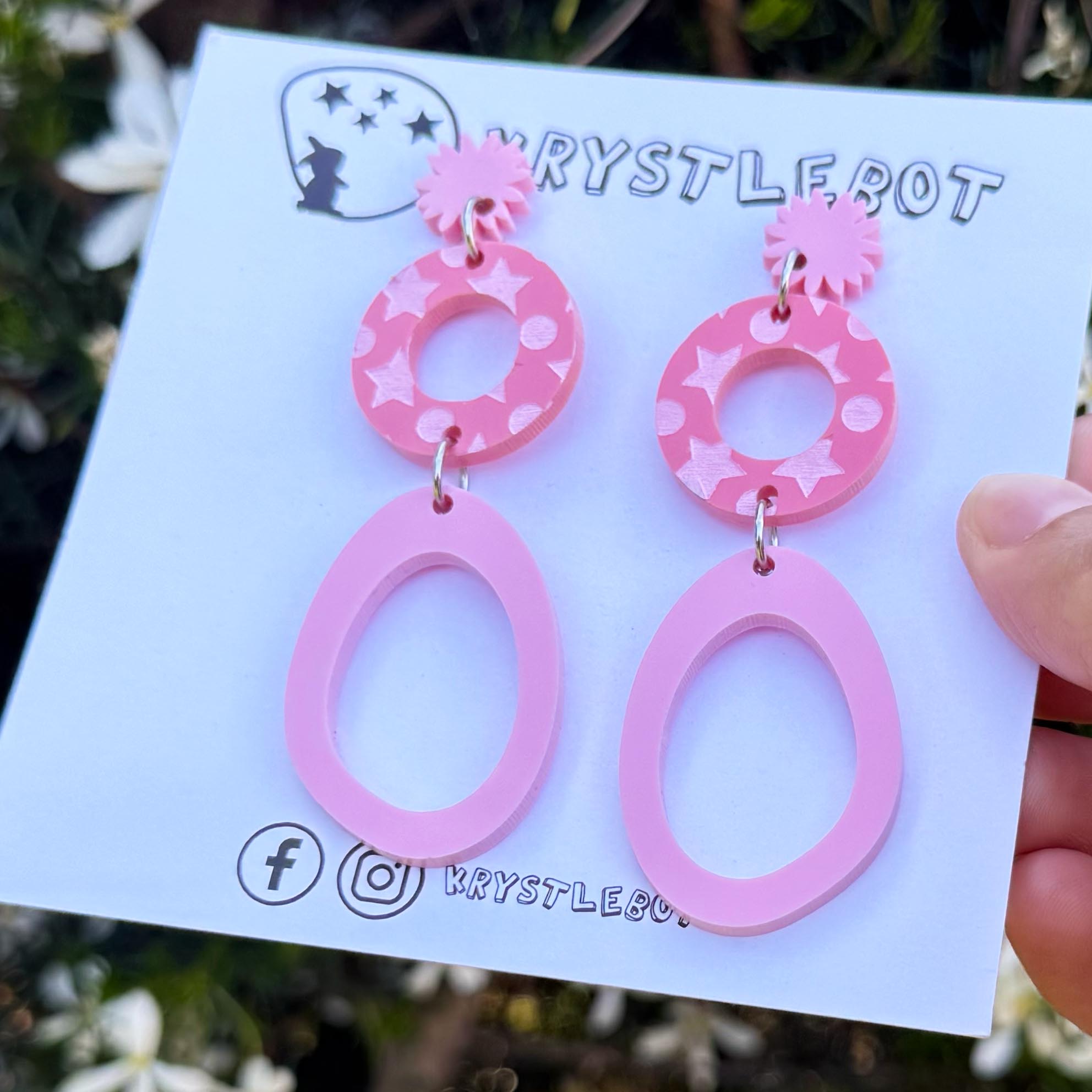 Two pink starburst, circle and large oval dangle earrings with star patterned painted centre, Acrylic earrings, Lightweight dangles,Teacher Earrings
