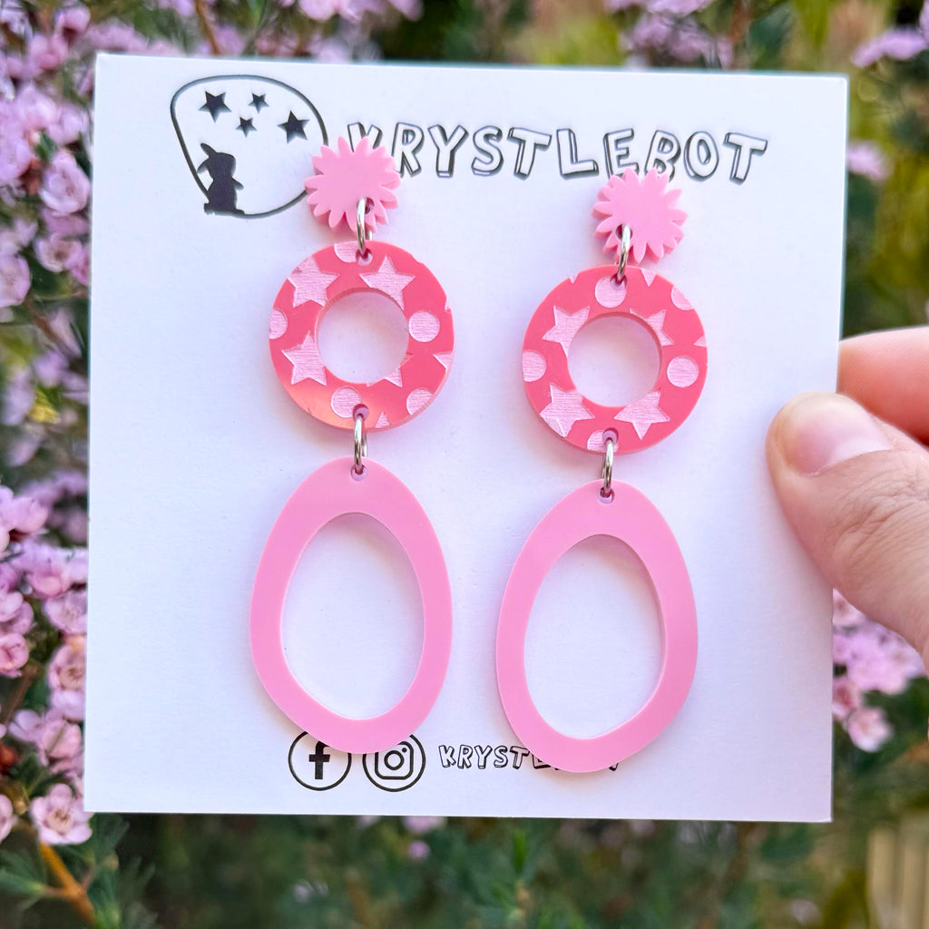 Two pink starburst, circle and large oval dangle earrings with star patterned painted centre, Acrylic earrings, Lightweight dangles,Teacher Earrings